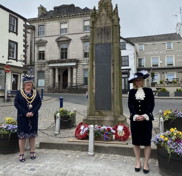 High Sheriff Julie Barton lays flowers at Market Cross VE Day