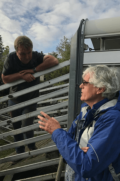 David Beeby getting back to his roots and talking with a farmer